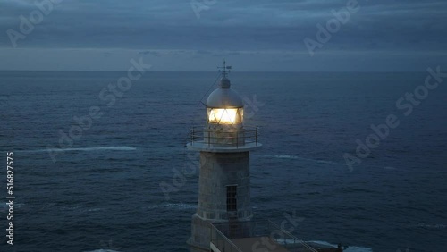 santa catalina lighthouse glowing at dusk photo