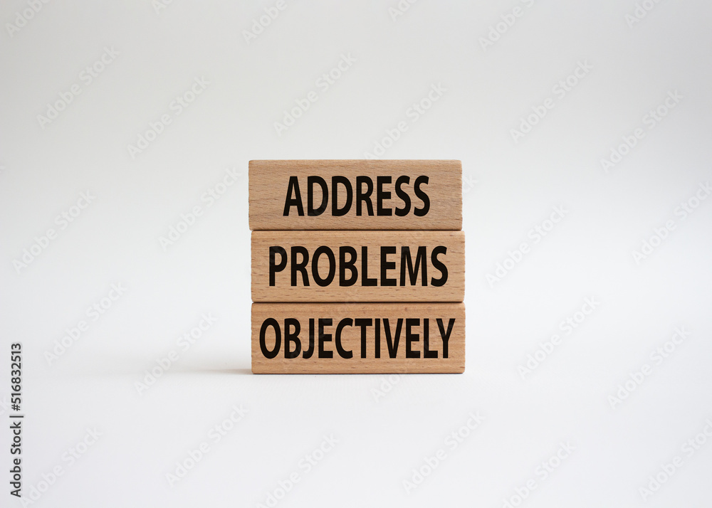Address Problems Objectively symbol. Wooden blocks with words Address Problems Objectively. Beautiful white background. Business and Address Problems Objectively concept. Copy space.