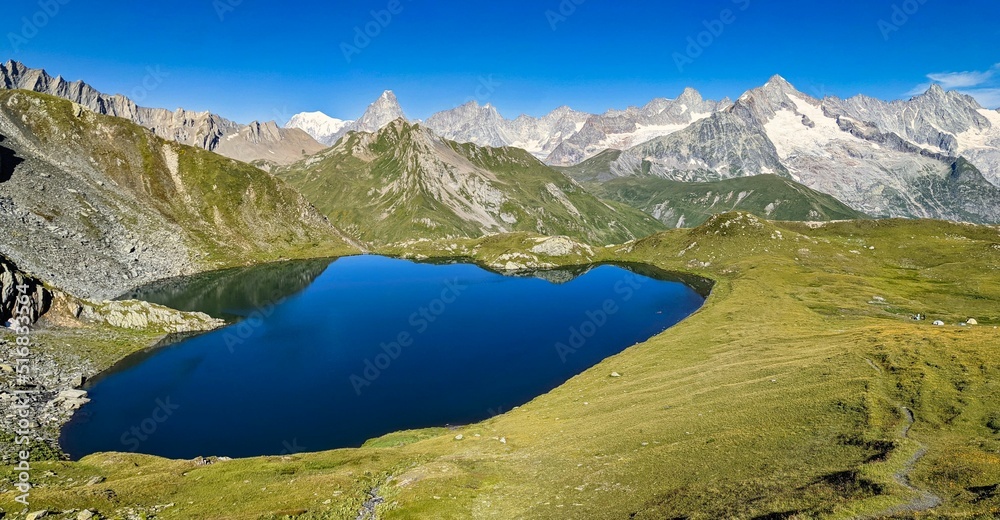 Lac de Fenêtre in Valais in Val Ferret valley and near the Great St. Bernhard. Nice view over the lake to the mountains.