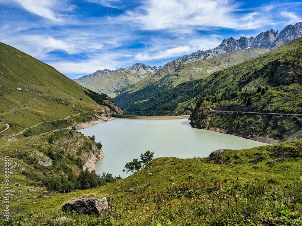 lac des toules in valais switzerland. Next to the pass road on the great Sankt Bernhard. reservoir in the mountains.
