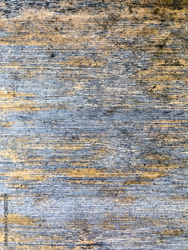 Horizontal weathered thin plank in the wooden wall close-up