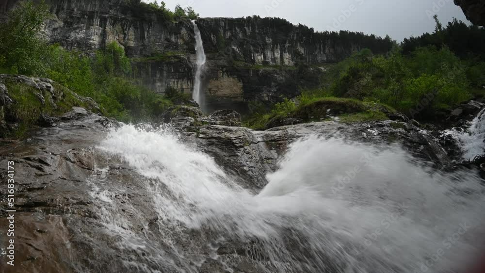 slow motion river cascade flowing down stream 120fps, 4k, 5k, follow the stream big waterfall, alps panoramic shot slow motion river cascade flowing down stream 120fps, 4k, 5k, follow the stream big waterfall, alps panoramic shot