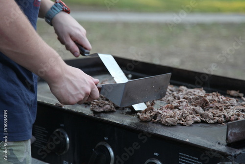 cooking cheesesteaks while camping on portable griddle