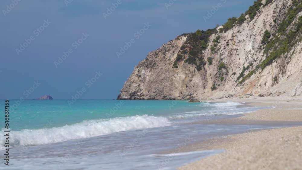 Peaceful empty beach. Waves and rocks. Summer solitude. Peaceful empty beach. Waves and rocks. Summer solitude.