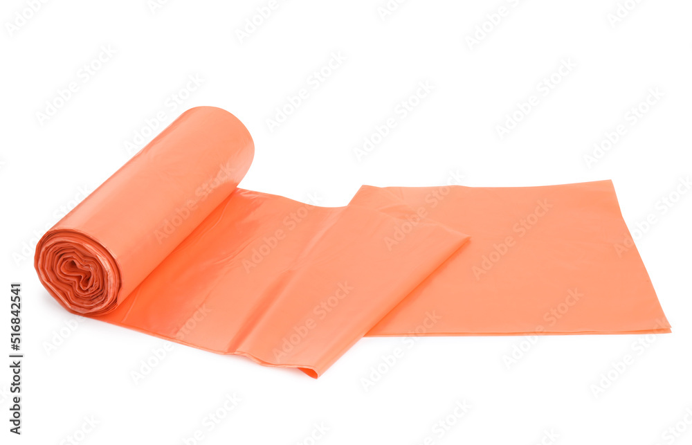Roll of orange garbage bags isolated on white Roll of orange garbage bags isolated on white