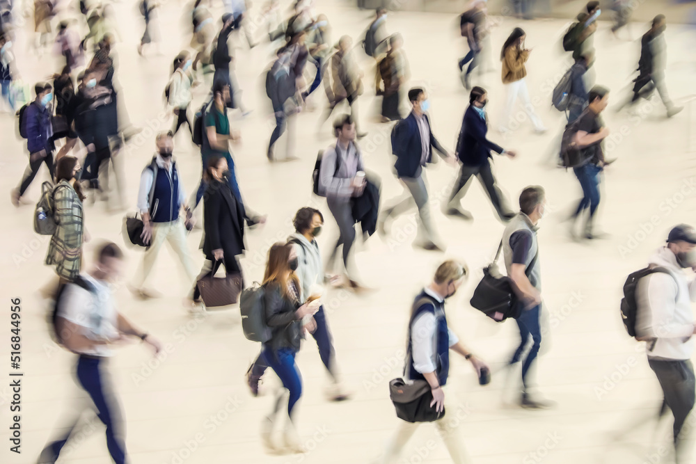 Blur of focus, people in the lobby of a public building