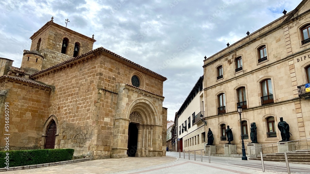 SORIA,SPAIN - JUNE 25, 2022 -View at the Provincial Administration Palace with San Juan de Rabanera church in Soria.