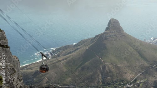 Table Mountain aerial cableway with Lion's Head mountain in the background in Cape Town, South Africa. 