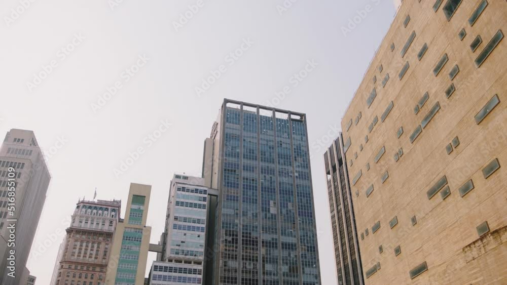 city skyscrapers with bird, pan left to right city skyscrapers with bird, pan left to right
