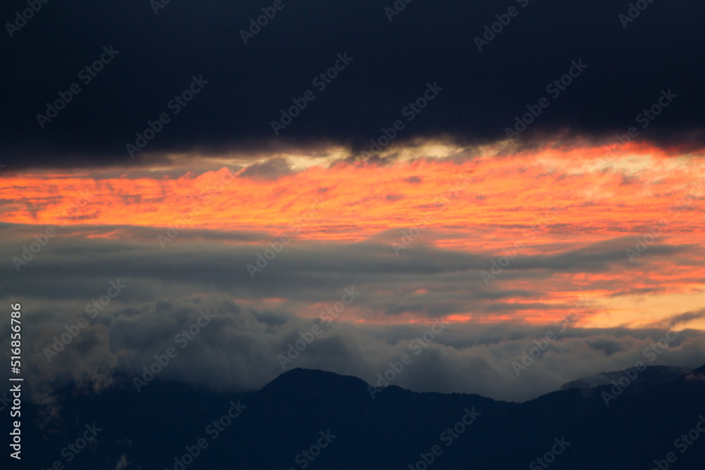 fiery sunset over the mountains fiery sunset over the mountains