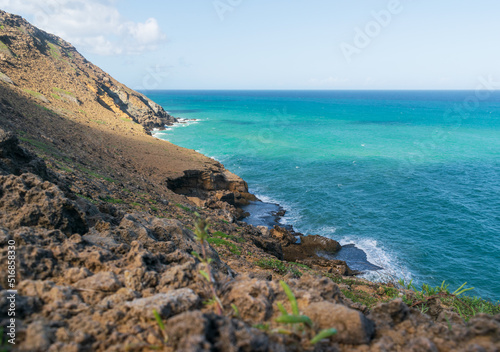 Turquoise sea and sharp rocks form the landscape on the Cape of the Sale, a beautiful place in the north of Colombia 