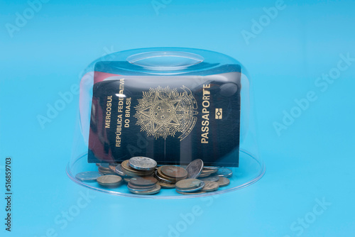 A passport with money protected by a glass dome