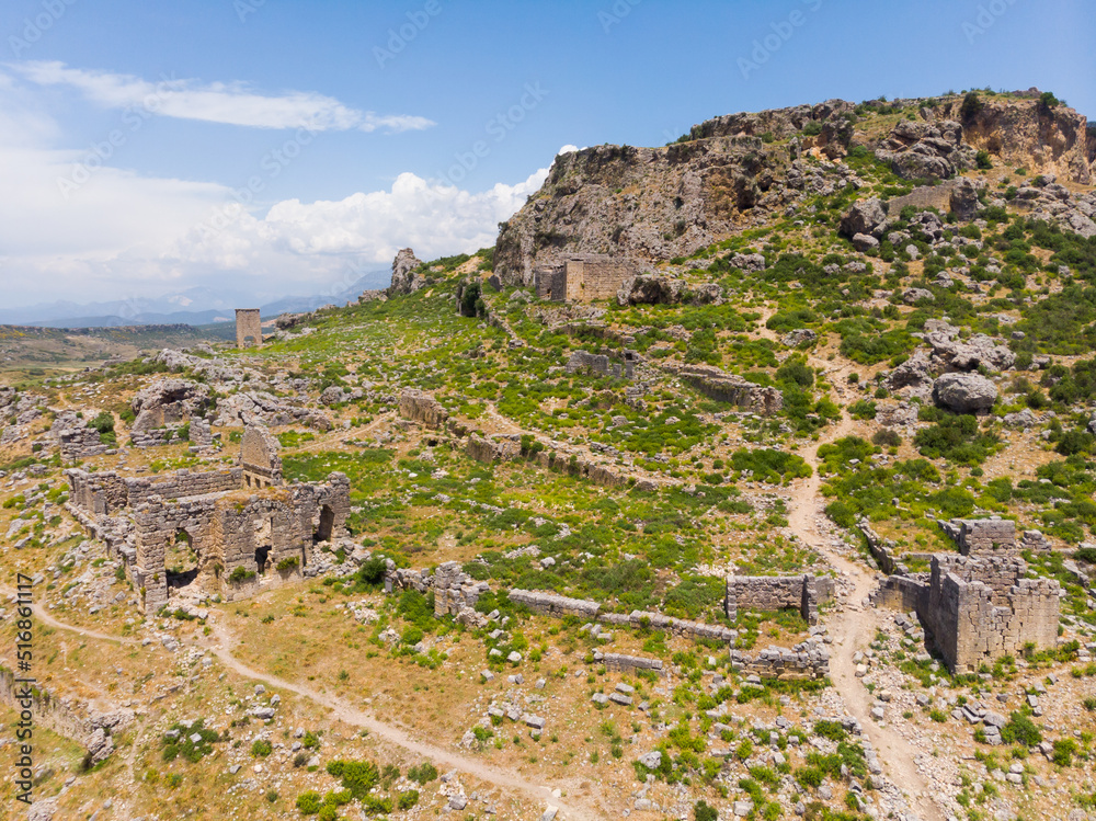 View of stone remains of Sillyon, ancient Pamphylian city and hilltop fortress located near town of Serik in Antalya province on spring day. Archeological, historical and cultural sights of Turkey