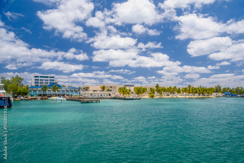 Port with sailboats and ships in Isla Mujeres island in Caribbean Sea, Cancun, Yucatan, Mexico