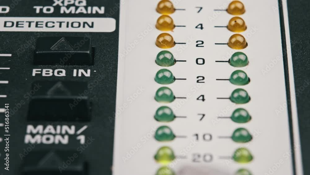 LED indicator of sound level signal on the mixing console. Closeup