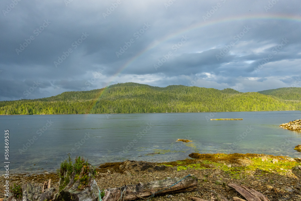 A rainbow over McLoughlin Bay where B.C. Ferries dock for the town of Bella Bella on the Inland Passage up British Columbia's Central Coast.  Room for text.
