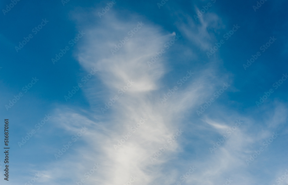 Cirrus clouds in the blue sky