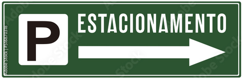 A green sign indicating the parking for vehicles in Portuguese language. photo