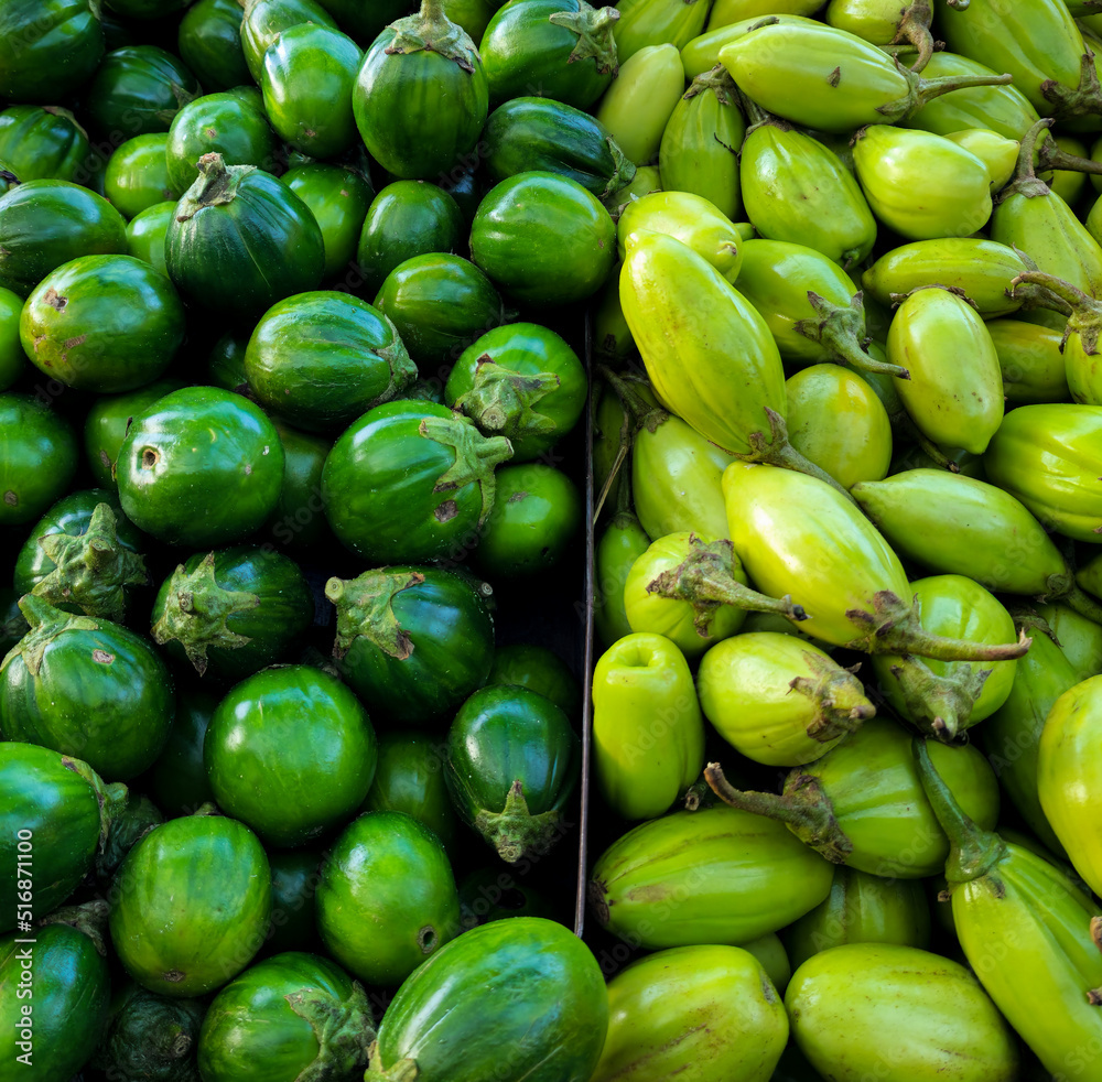 fresh carlet eggplant (jilo) sold at street fair fresh carlet eggplant (jilo) sold at street fair