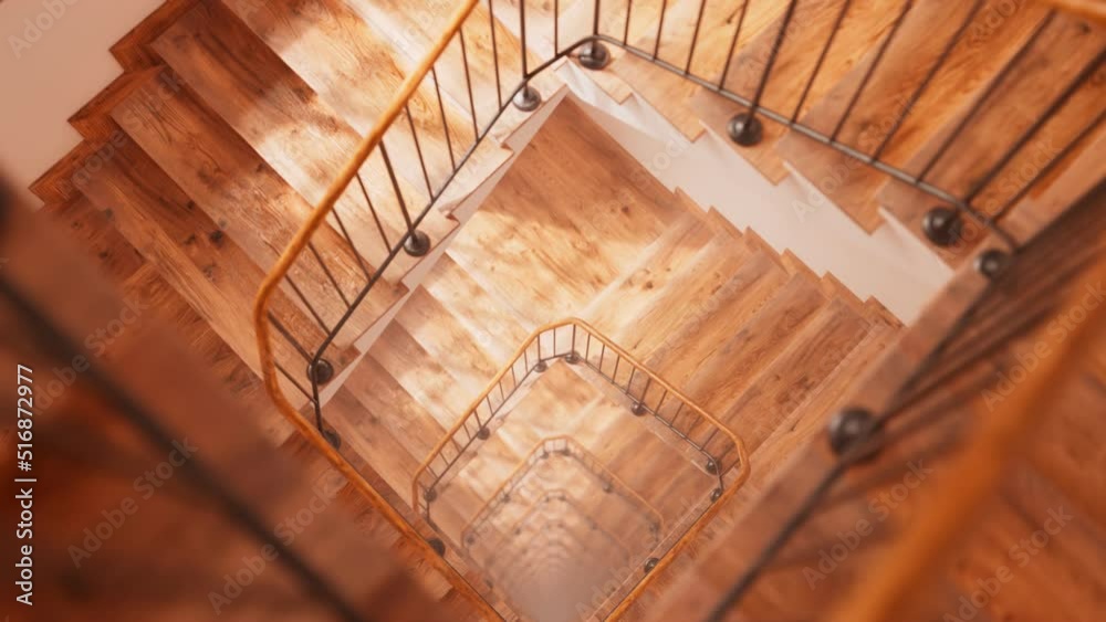 Camera falls down through an endless, seamless, wooden vintage staircase 4K HD