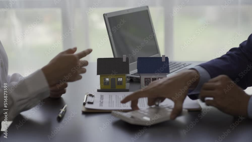 Company employees discussing the details before the customer agrees to sign the lease. by explaining the details and terms and conditions of the rental and buy real estate rental ideas 4k video Company employees discussing the details before the customer agrees to sign the lease. by explaining the details and terms and conditions of the rental and buy real estate rental ideas 4k video