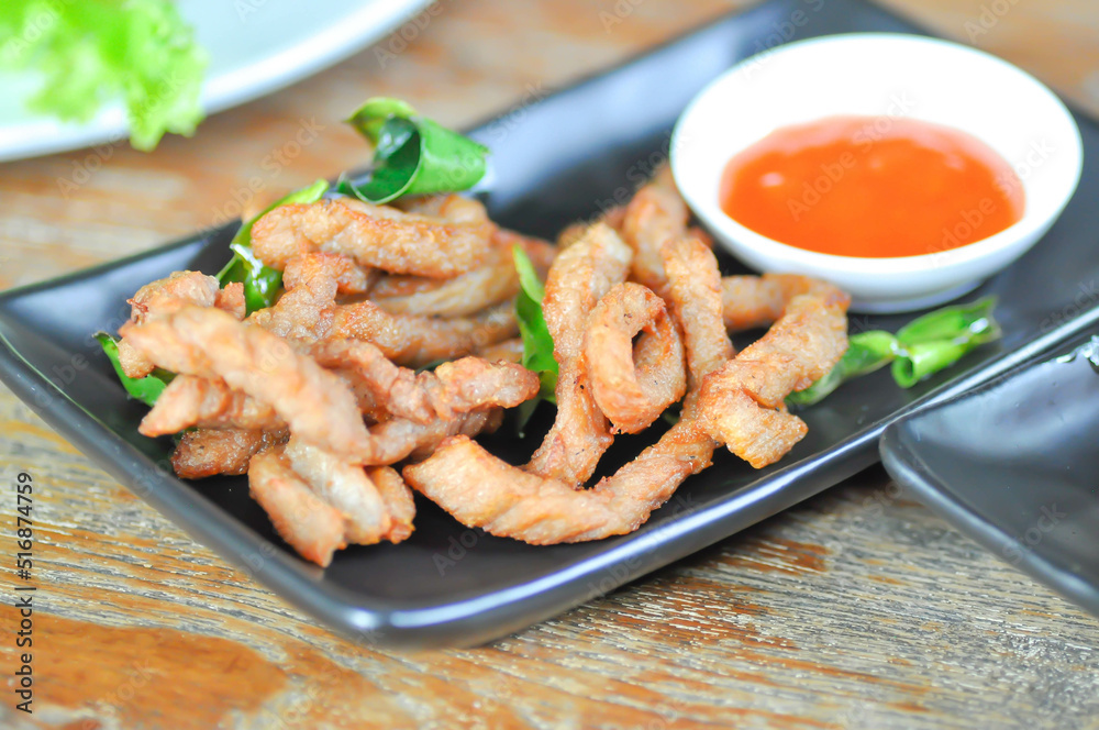 pork or fried pork , deep fried pork with sauce pork or fried pork , deep fried pork with sauce