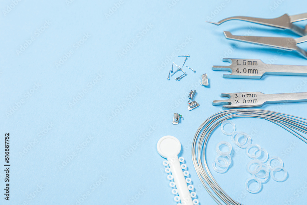 a set of special tools for an orthodontist to install braces for a