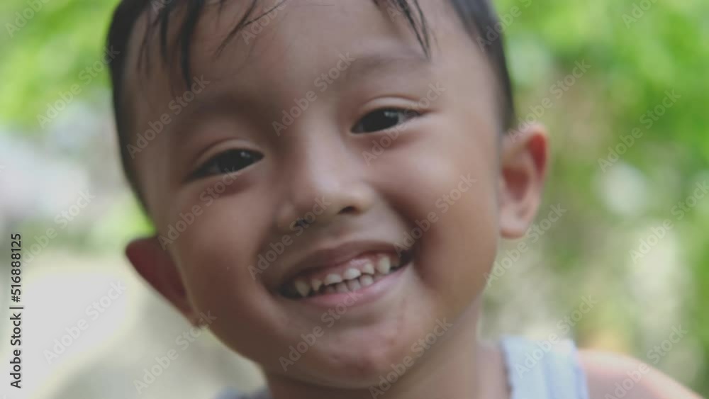 little boy asian kid smiling to camera and show happy excited expression little boy asian kid smiling to camera and show happy excited expression