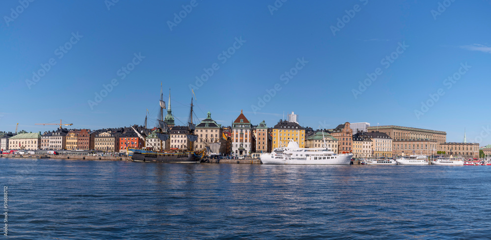 Obraz premium The replica of the old Indian Man Götheborg, at the pier Skeppsbron in the old town Gamla Stan, for the East India arriving to Shanghai 2023, a sunny summer day in Stockholm
