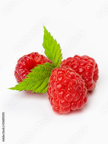 Raspberries isolated on white background close up. Raspberries Clipping Path. Mint Raspberries macro studio photo