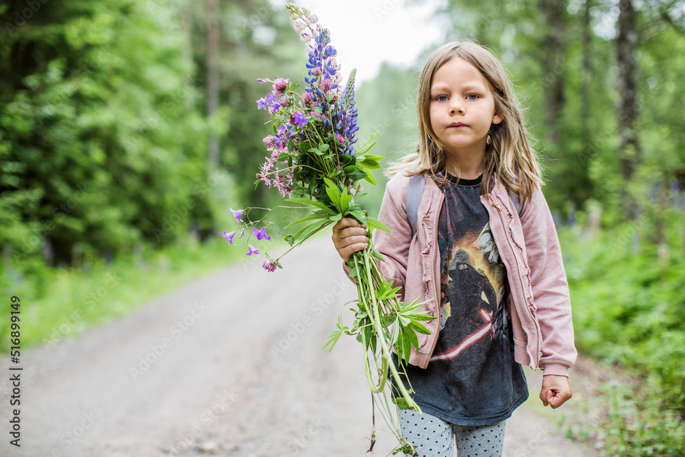 Girl holding bouquet of flowers Girl holding bouquet of flowers