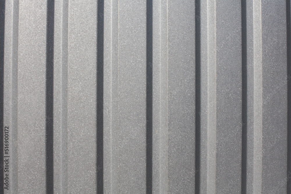 Grey corrugated metal background and texture surface or galvanize steel, Texture of a sheet metal aluminum facade. Grey corrugated metal background and texture surface or galvanize steel, Texture of a sheet metal aluminum facade.