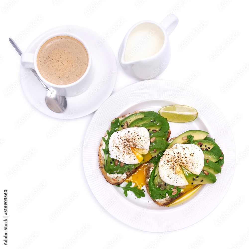 Freshly made poached egg and Avocado toasts isolated on white background Freshly made poached egg and Avocado toasts isolated on white background