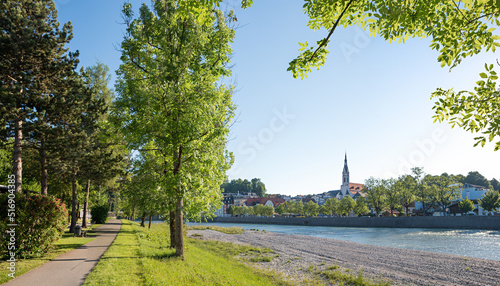 walkway Isar riverside with view to old town Bad Tolz  in the morning