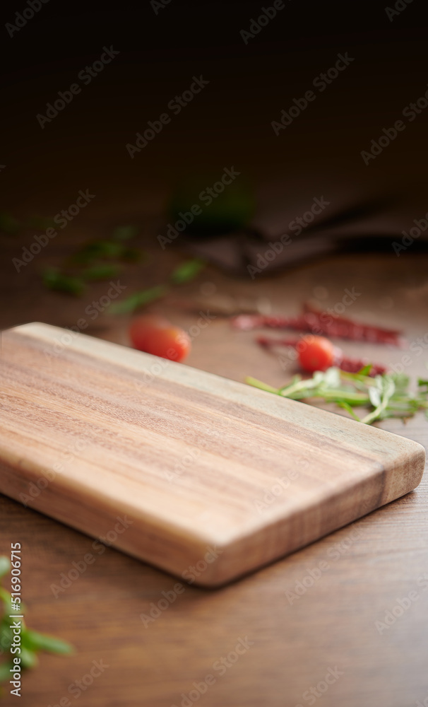 Empty chopping board and spices background Empty chopping board and spices background