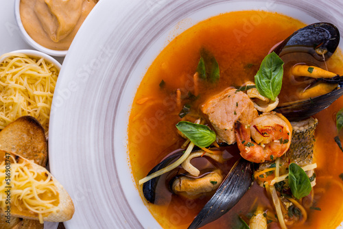 Soup with fish, shrimps, mussels