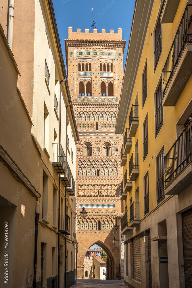View at the Saint Martin tower in Mudejar style in the streets of Teruel - Spain View at the Saint Martin tower in Mudejar style in the streets of Teruel - Spain