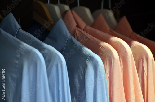 Men`s shirts in clothing store.
