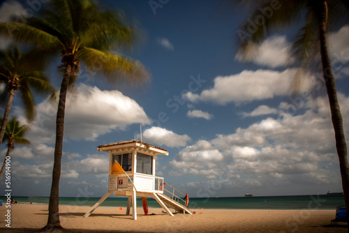 Lifeguard station and palm trees on beach in Fort Lauderdale Florida