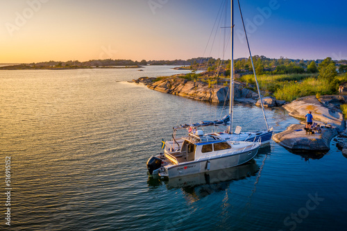 Boats moored at island in Stockholm Archipelago Sweden