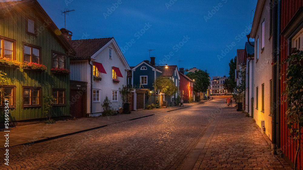 Houses on street at night Houses on street at night