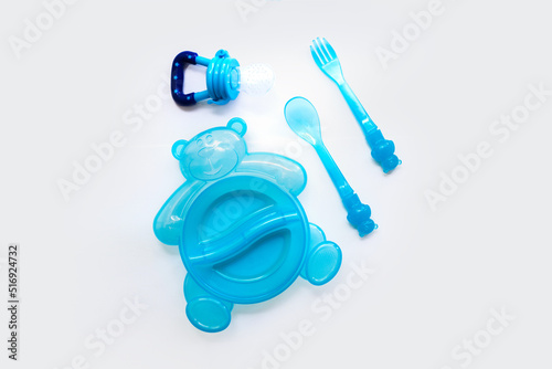 A set of children's plastic utensils for feeding