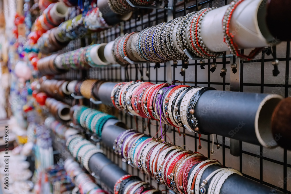 Trendy handmade bracelets and wristbands for sale at artisans market. Handcraft souvenir at flea market. Purchase of elegant souvenirs Trendy handmade bracelets and wristbands for sale at artisans market. Handcraft souvenir at flea market. Purchase of elegant souvenirs