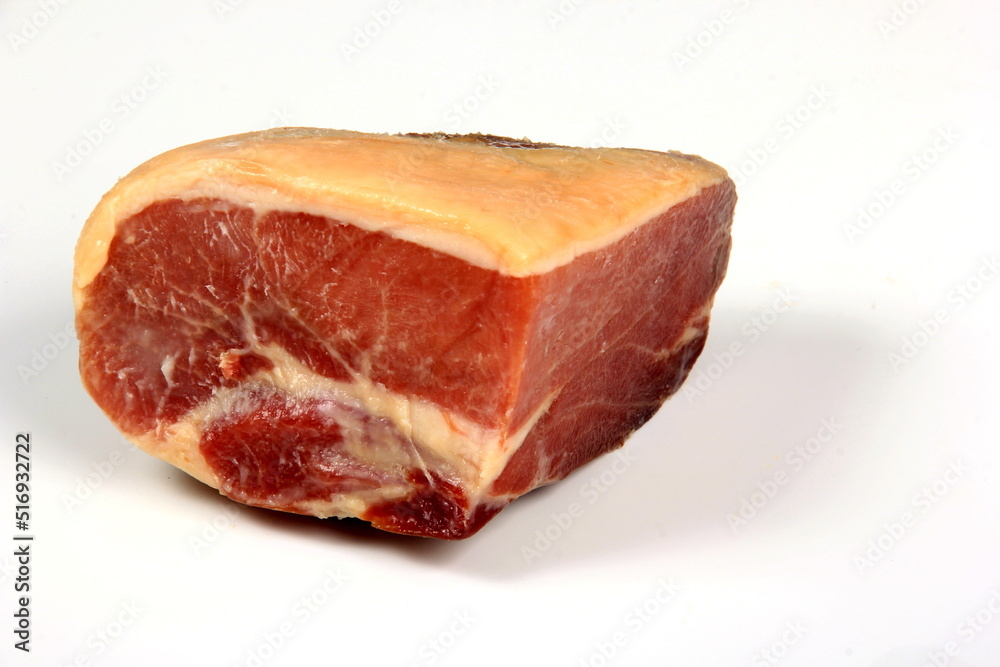 Spanish ham on a white background. Iberian hamon Spanish ham on a white background. Iberian hamon