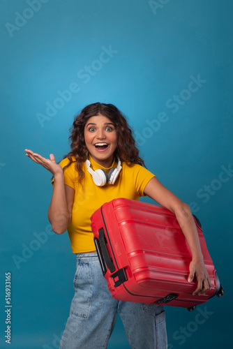 Beautiful young woman with suitcase/luggage