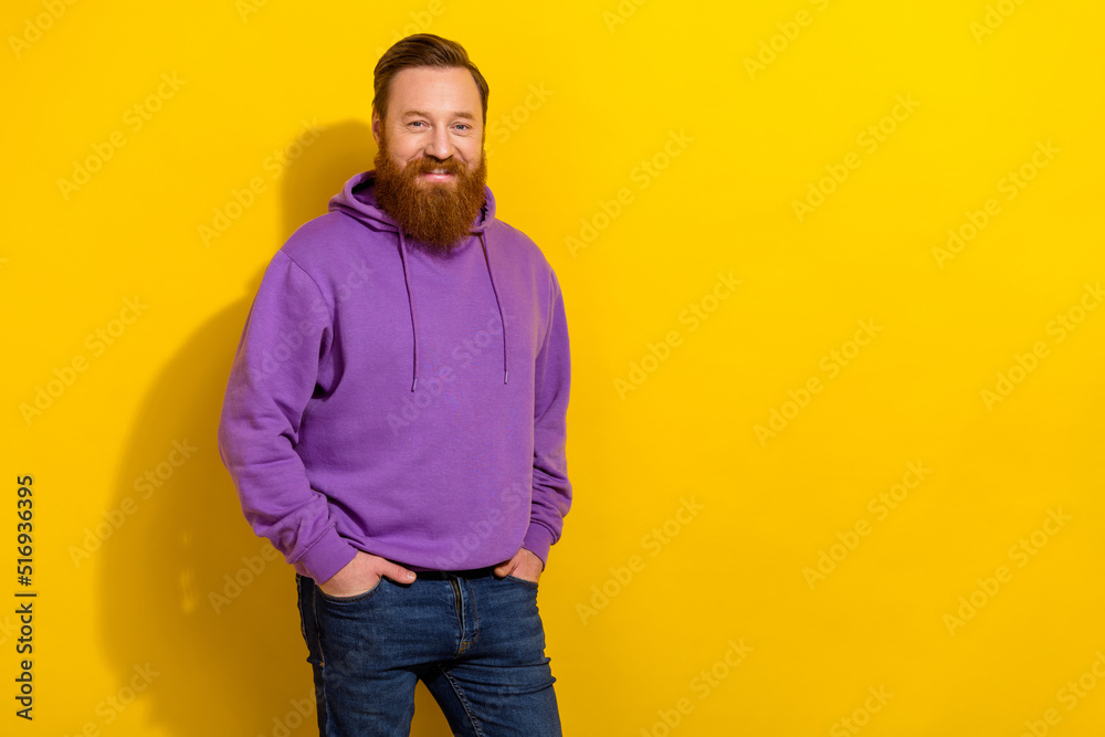 Photo of young good mood intelligent businessman wear comfy purple hoodie isolated on yellow color background Photo of young good mood intelligent businessman wear comfy purple hoodie isolated on yellow color background