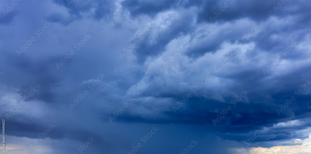 Light in the Dark and Dramatic Storm Clouds background Light in the Dark and Dramatic Storm Clouds background