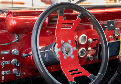 Steering wheel and dashboard of an vintage off-road vehicle