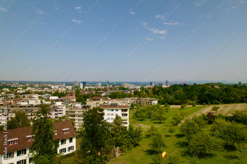 Aerial view over City of Zürich seen from district Schwamendingen on a sunny hot summer day. Photo taken June 21st, 2022, Zurich, Switzerland.