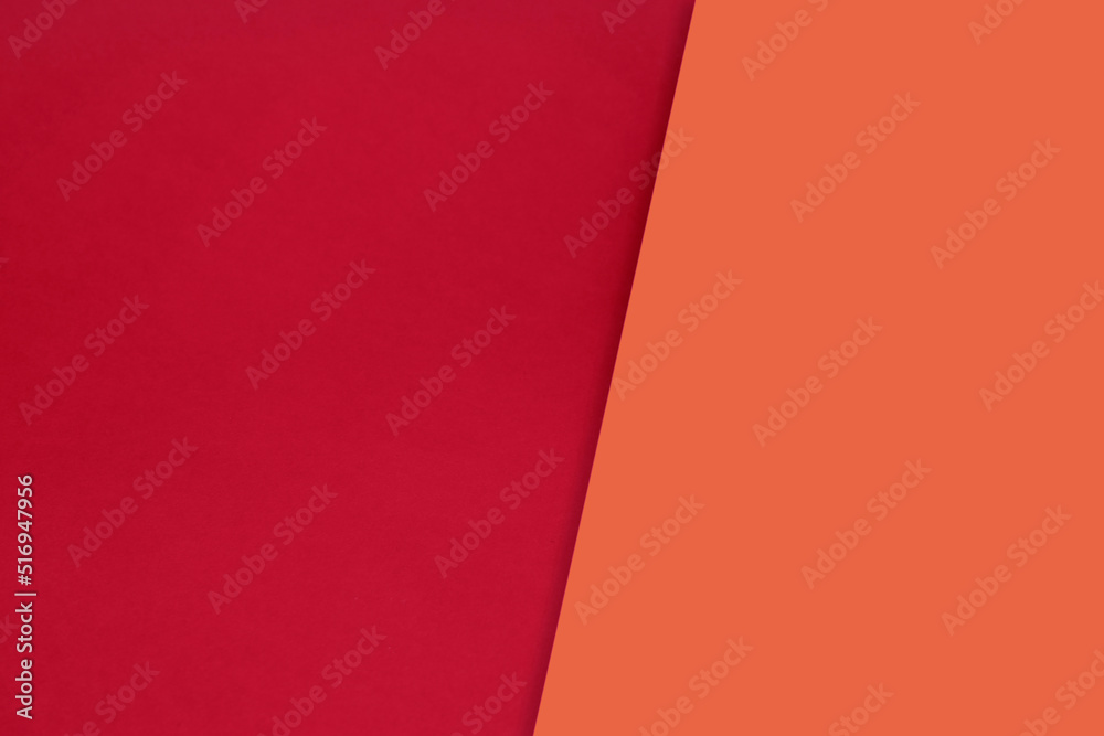 Dark vs light abstract Background with plain subtle smooth de saturated red orange peach colours parted into two	